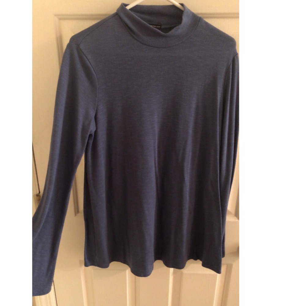 Large blue turtle neck shirt with bell sleeves